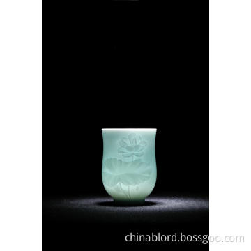 Shadow green carved lotus holding cup